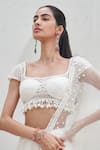 Shop_Mahima Mahajan_Ivory Net Embroidered Tehzeeb Sequin Embellished Pre-stitched Saree With Blouse _Online_at_Aza_Fashions