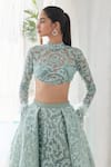 Mahima Mahajan_Green Net Embroidered Crystal Band Rani Floral Embellished Lehenga With Blouse_at_Aza_Fashions