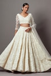 Shop_Mala and Kinnary_Ivory Net Embroidered Pearl V-neck Scallop Bridal Lehenga Set _at_Aza_Fashions