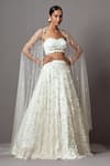 Shop_Mala and Kinnary_Ivory Net Embroidered Pearl 3-d Bellflower Embellished Lehenga Set _Online_at_Aza_Fashions