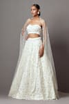 Mala and Kinnary_Ivory Net Embroidered Pearl 3-d Bellflower Embellished Lehenga Set _at_Aza_Fashions