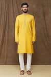 Buy_Samyukta Singhania_Yellow Kurta Linen Cotton Plain Bright Thread Work Placket Set_at_Aza_Fashions