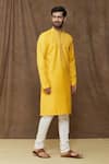 Shop_Samyukta Singhania_Yellow Kurta Linen Cotton Plain Bright Thread Work Placket Set_at_Aza_Fashions