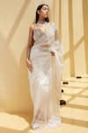 Buy_Istya_Ivory Organza Tissue Embellished Stones Plunging V Neck Saree With Blouse _at_Aza_Fashions