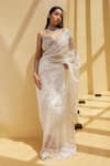 Shop_Istya_Ivory Organza Tissue Embellished Stones Plunging V Neck Saree With Blouse _at_Aza_Fashions