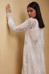 Shop_Istya_Ivory Jacket- Net Embroidered Beads Leaf Floral With Draped Skirt Set _at_Aza_Fashions