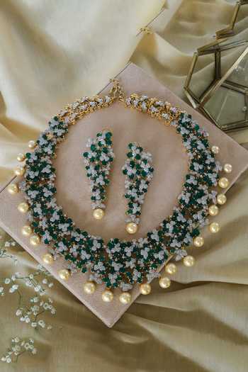 Shop_Studio6 Jewels_Green Crystals, Pearls Floral Cut Work Studded Necklace Set _at_Aza_Fashions