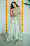 Buy_Foram Patel_Beige Organza Embroidered Cutdana V-neck Lotus Embellished Bridal Lehenga Set _at_Aza_Fashions