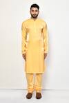 Buy_Arihant Rai Sinha_Yellow Satin Plain Churidar _Online_at_Aza_Fashions