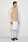 Arihant Rai Sinha_Yellow Silk Printed Paisley Checkered Bundi _at_Aza_Fashions