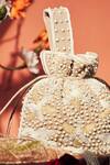 Shop_Aamli_Beige Beads Phool Pearl Embellished Potli Bag _at_Aza_Fashions