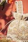 Aamli_Beige Beads Phool Pearl Embellished Potli Bag _Online_at_Aza_Fashions