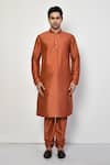 Shop_Arihant Rai Sinha_Orange Kurta And Churidar Silk Plain Long Bright Set _Online_at_Aza_Fashions