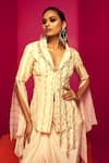 Krisha sunny Ramani_Ivory Georgette Printed Floral Lapel Collar Blazer And Dhoti Skirt Set _at_Aza_Fashions