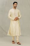 Buy_Arihant Rai Sinha_Beige Kurta Art Silk Embroidered Placket Tonal Thread Straight With Churidar _at_Aza_Fashions