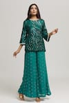 Kunwaraniritu_Green Georgette Embellished Sequins Round Neck Tunic With Palazzo _at_Aza_Fashions
