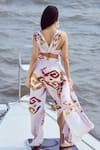 Shop_Nirmooha_Peach Modal Satin Print Patola Mosaic High Waist Side Slit Pant _at_Aza_Fashions
