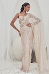 Buy_Mahima Mahajan_Beige Net Embellished Sequin Kaynaat Wave Pre-stitched Saree With Blouse_at_Aza_Fashions