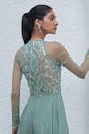 Mahima Mahajan_Green Net Hand Embroidery Sequins Round Neck Yasmeen Jumpsuit _at_Aza_Fashions