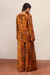 Shop_REENA SHARMA_Orange Viscose Velvet Print Floral Plunging V Nargis Jacket With Pleated Pant _at_Aza_Fashions