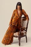 REENA SHARMA_Orange Viscose Velvet Print Floral Plunging V Nargis Jacket With Pleated Pant _at_Aza_Fashions