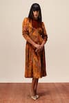 Buy_Reena Sharma_Orange Viscose, Velvet Round Neck Nargis Print Midi Dress _at_Aza_Fashions