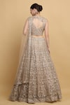 Shop_Aham-Vayam_Beige Net Embroidered Floral Leaf Neck Swanidhya Bridal Lehenga Set _at_Aza_Fashions