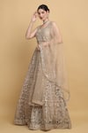 Aham-Vayam_Beige Net Embroidered Floral Leaf Neck Swanidhya Bridal Lehenga Set _Online_at_Aza_Fashions