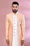 Shop_Arihant Rai Sinha_Peach Jacquard, Silk Embroidery Floral Woven Jacket Kurta And Churidar Set _Online_at_Aza_Fashions