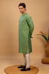 Shop_Agape_Green Cotton Silk Pleated Panel Kurta And Churidar Set _Online_at_Aza_Fashions