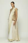 Abraham & Thakore_Ivory Silk Woven Circular Pattern Saree _at_Aza_Fashions