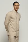 Abraham & Thakore_Beige Poplin Digonal Pleated Button Down Shirt  _at_Aza_Fashions