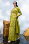 Mona and Vishu_Green Dupion Silk Embroidered Crystal Lapel Zari Work Trench Coat Wide Leg Pant _at_Aza_Fashions