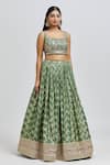 Shop_MeenaGurnam_Green Blouse Russian Silk Woven Floral Square Neck Blossom Pattern Lehenga Set _Online_at_Aza_Fashions