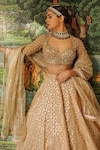 Buy_Neha Khullar_Beige Net Woven Geometric Patterns Sweetheart Neck Bridal Lehenga Set _at_Aza_Fashions