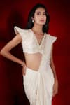 Shloka Khialani_Ivory Georgette Inez Tasselled Edge Pre-draped Saree With Blouse  _Online_at_Aza_Fashions