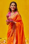 Weaver Story_Orange Cotton And Chanderi Placement Zari Border Handloom Saree For Women_Online_at_Aza_Fashions