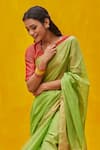 Weaver Story_Green Handloom Pure Tissue Silk Chanderi Placement Zari Border Saree _Online_at_Aza_Fashions