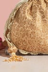 Buy_AMYRA_Gold Woven Kashi Blossom Potli _Online_at_Aza_Fashions