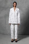 Buy_Mellowdrama_White 100% Cotton Embellished Swarovski Lapel Collar Blazer With Pant _at_Aza_Fashions