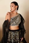 Shop_Suruchi Parakh_Black Georgette Crepe Hand Embroidered Foil One Shoulder Floral Lehenga Set _Online_at_Aza_Fashions