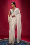 Buy_Ranbir Mukherjee Calcutta_Ivory Satin Georgette Embellishments Sequin Saree With Bralette  _at_Aza_Fashions