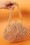 Buy_THE TAN CLAN_Gold Crystals Rosa Beaded Fringe Embellished Potli Bag_at_Aza_Fashions
