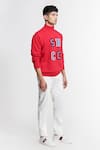 Shop_S&N by Shantnu Nikhil_Red Cotton Knitted Logo Patchwork Sweater _Online_at_Aza_Fashions