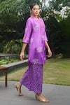 Shop Dyelogue Purple Silk Embroidery Mandarin Collar Lotus Bandhani Motif Kurta With Pant at Aza Fashions Shop_Dyelogue_Purple Silk Embroidery Mandarin Collar Lotus Bandhani Motif Kurta With Pant _at_Aza_Fashions