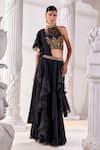 Buy_Mandira Wirk_Black Net Embroidered Cutdana Halter Corset Pre-draped Ruffled Saree Set_at_Aza_Fashions