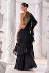 Mandira Wirk_Black Net Embroidered Cutdana Halter Corset Pre-draped Ruffled Saree Set_Online_at_Aza_Fashions