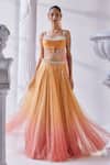 Buy_Mandira Wirk_Peach Net Embroidered Pearl Sweetheart Ombre Embellished Lehenga Set_at_Aza_Fashions