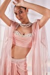 Shop_Mandira Wirk_Peach Satin Georgette Embroidered Pearl Ruched Corset Draped Skirt Set_Online_at_Aza_Fashions