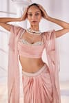 Shop_Mandira Wirk_Peach Satin Georgette Embroidered Pearl Ruched Corset Draped Skirt Set_at_Aza_Fashions